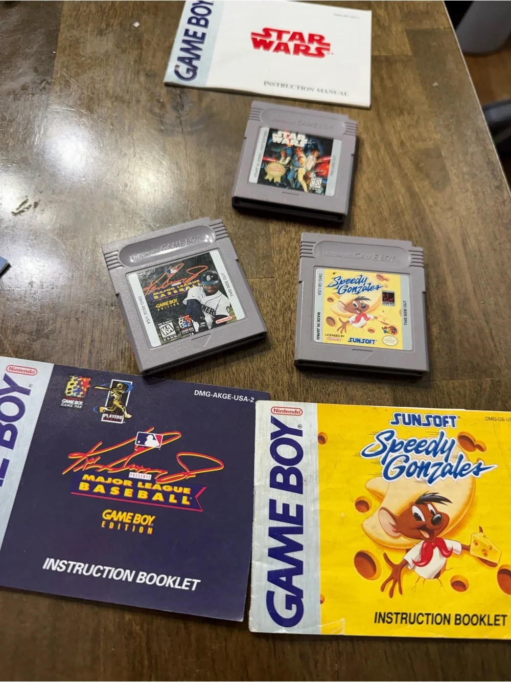 Nintendo Gray Game Boy Cartridge Bundle with Yellow & Blue Booklets